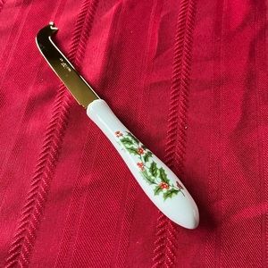 Home for the Holidays gold tone stainless cheese knife with Christmas Holly